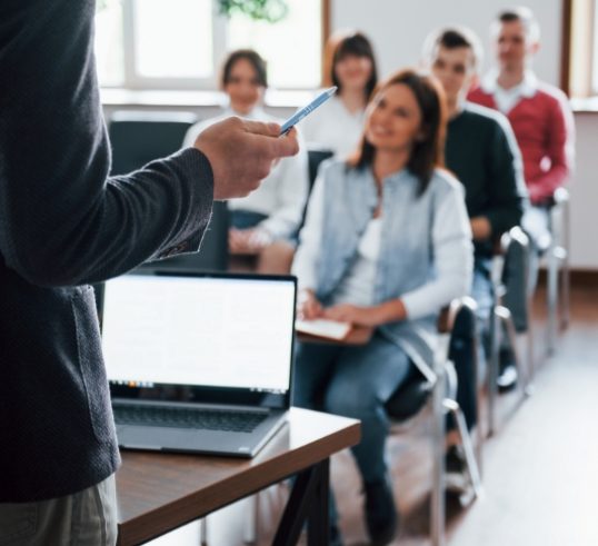 everyone-is-smiling-listens-group-people-business-conference-modern-classroom-daytime
